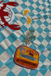 close up of block print embroidered tablecloth 