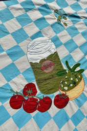 close up of block print embroidered tablecloth 