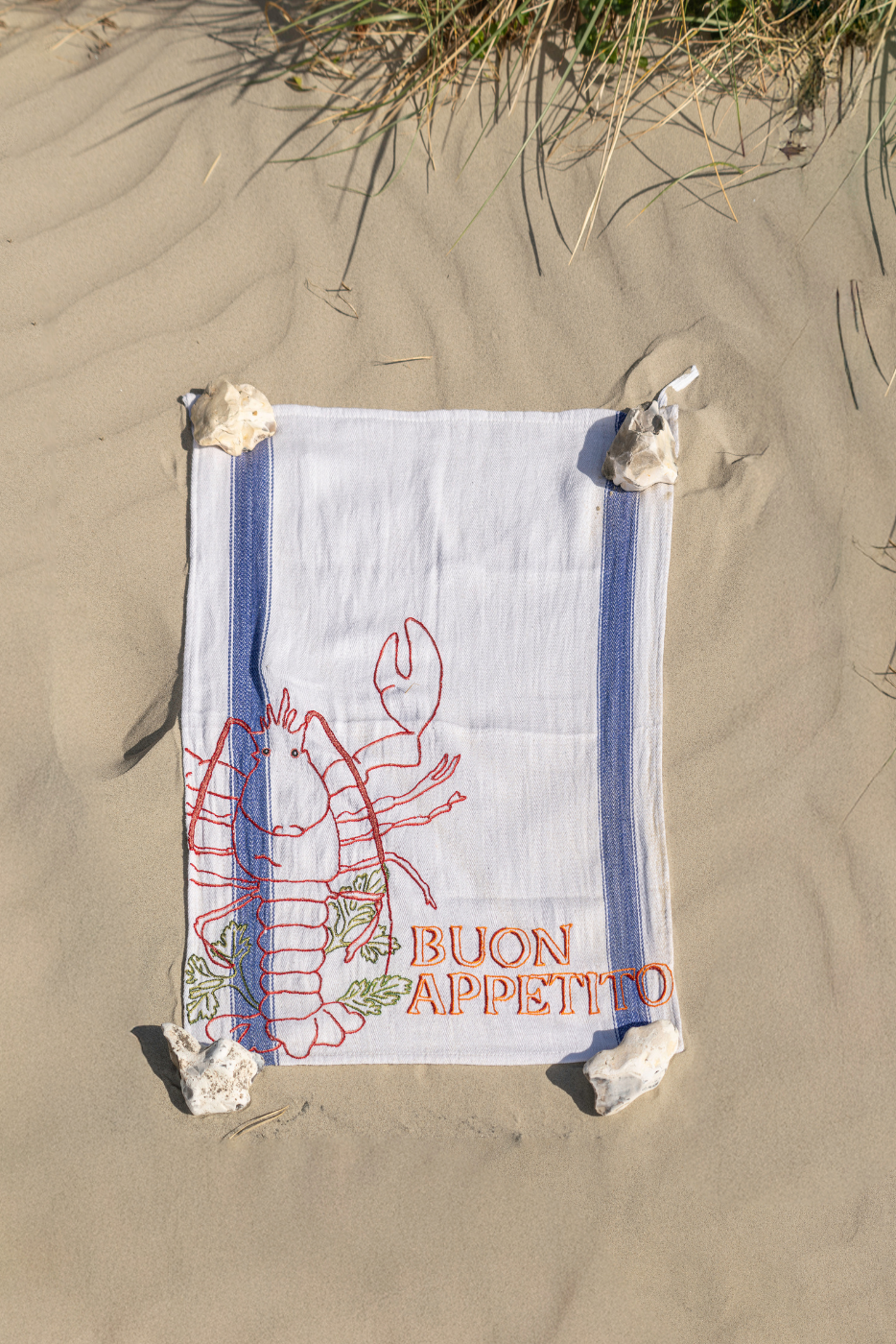 mediterranean buon appetito hand embroidered tea towel with lobster 