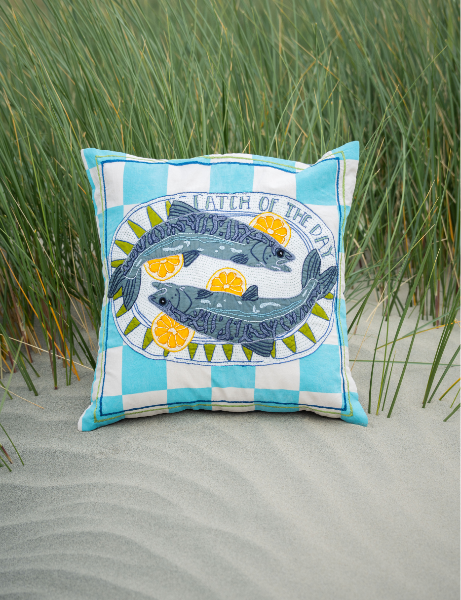 embroidered cushion with mackrel fish and lemons 