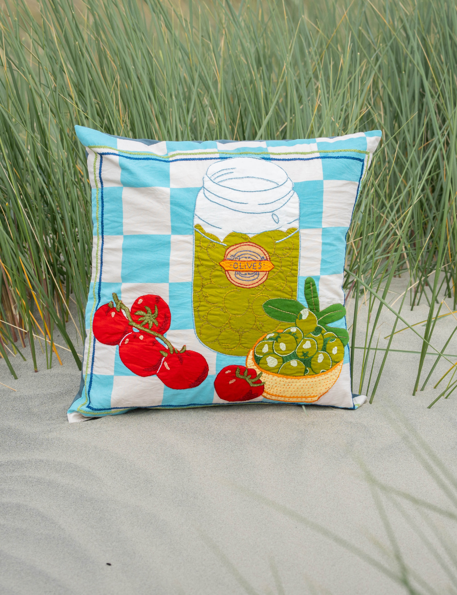 embroidered cushion with olives and tomatoes 