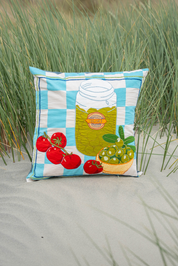 embroidered cushion with olives and tomatoes 