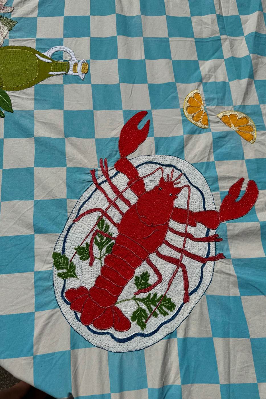close up of block print embroidered tablecloth 