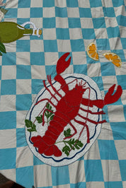 close up of block print embroidered tablecloth 