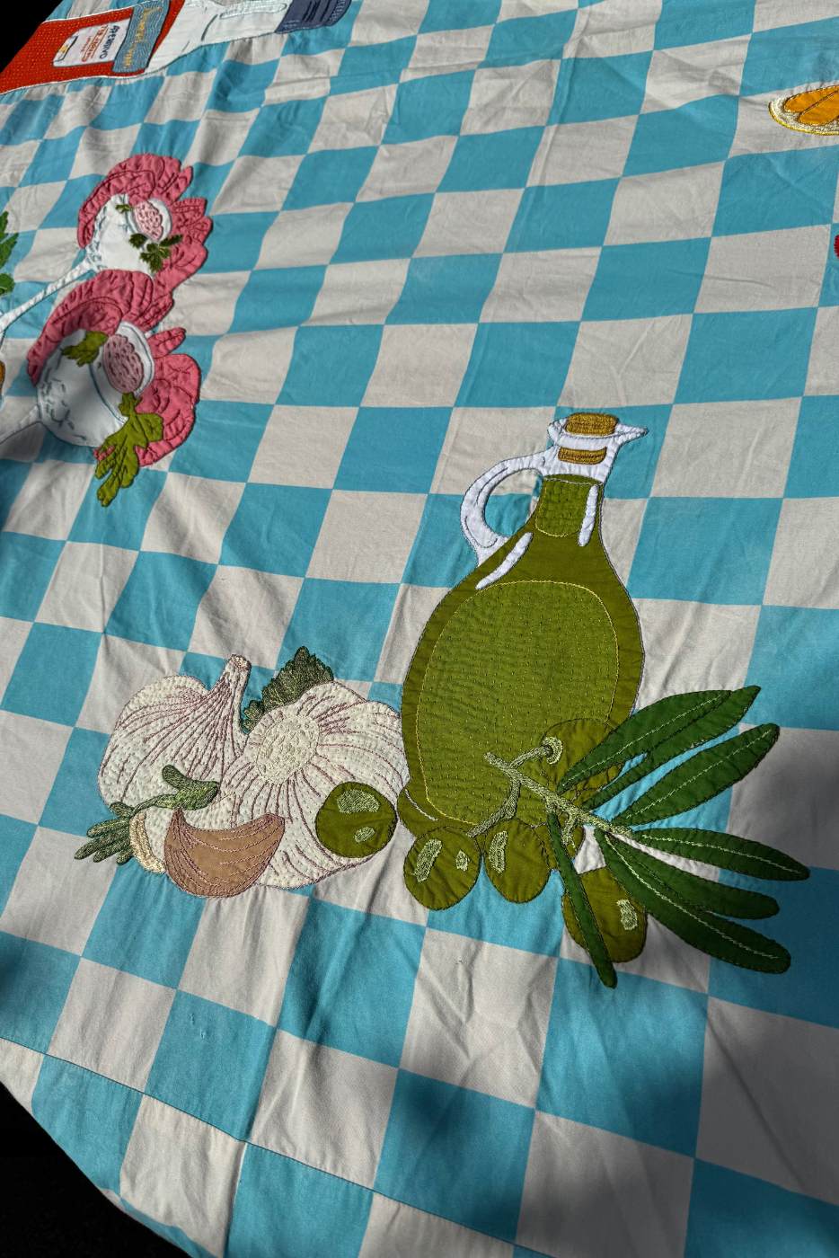 close up of block print embroidered tablecloth 