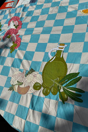 close up of block print embroidered tablecloth 