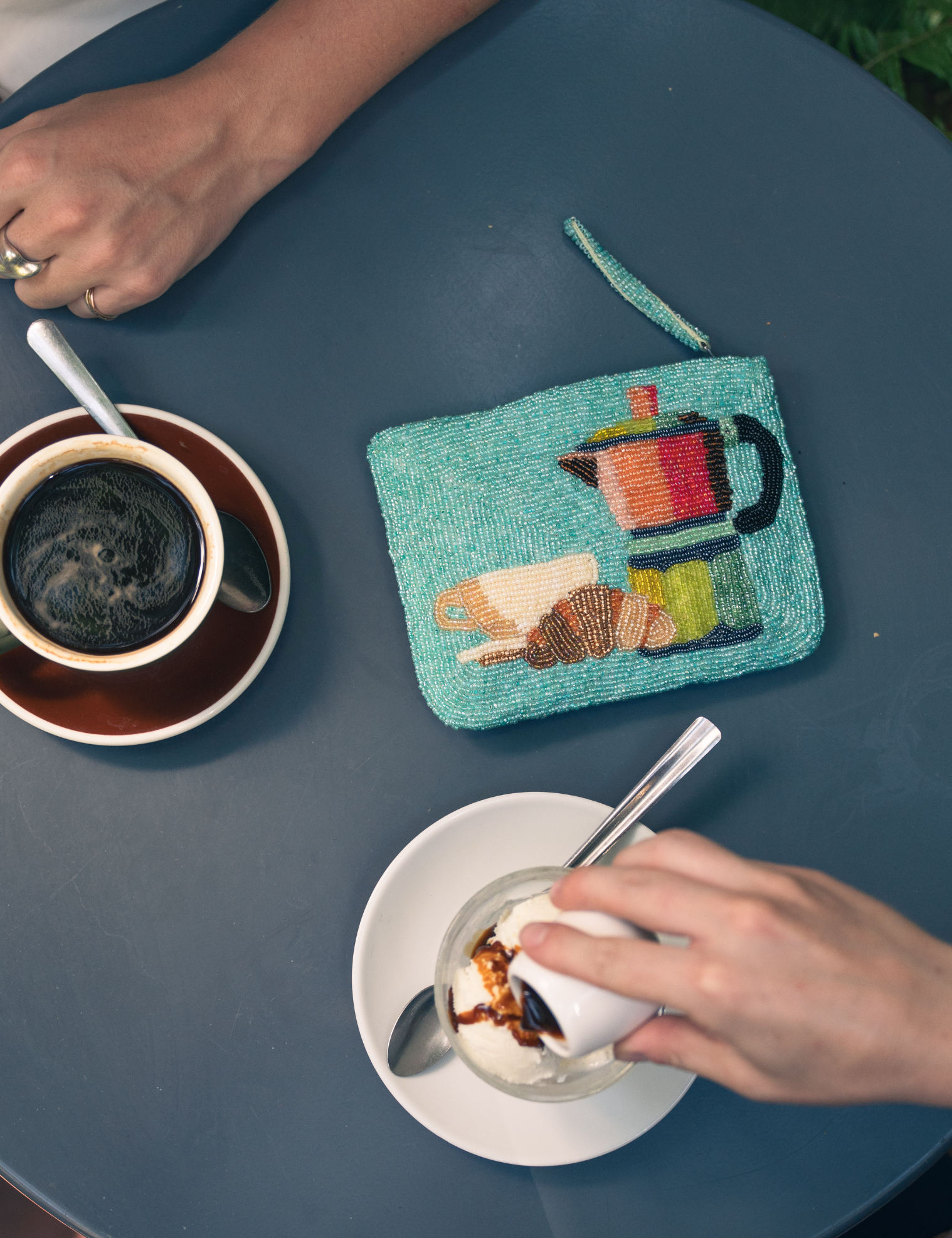 Coffee and croissant hand beaded purse in a pale turquoise aqua blue 