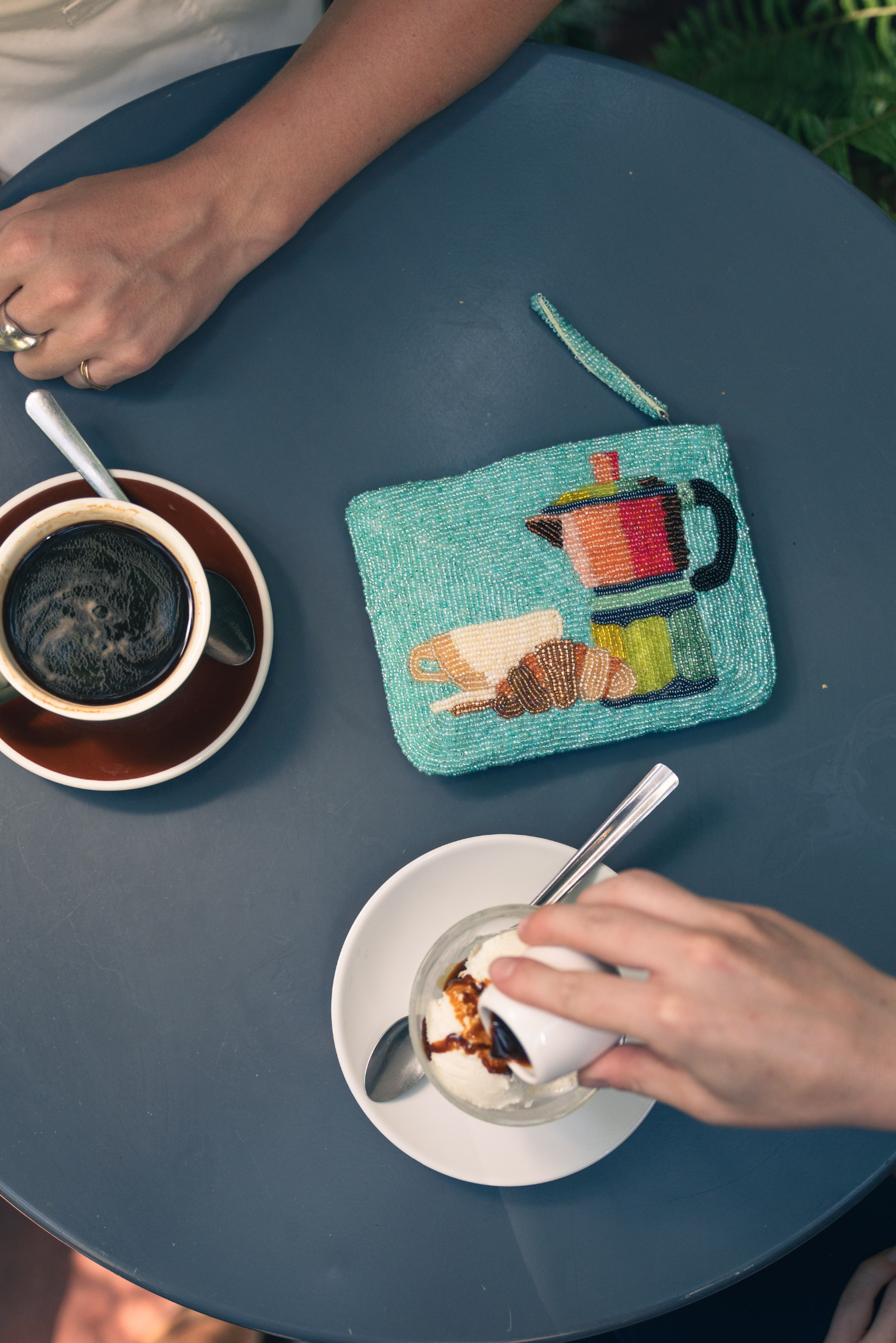 Coffee and croissant hand beaded purse in a pale turquoise aqua blue 
