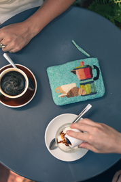Coffee and croissant hand beaded purse in a pale turquoise aqua blue 