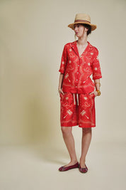 patterned red and natural shirt
