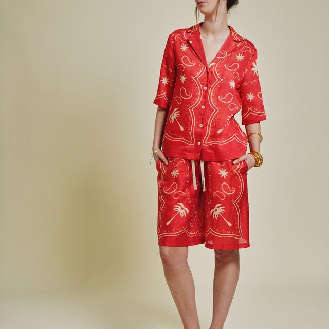 patterned red and natural shirt