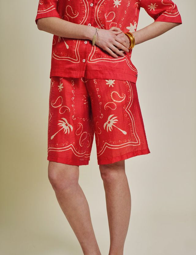 patterned red and natural shirt
