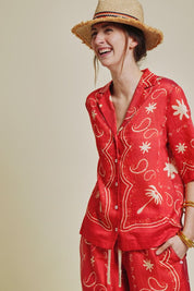 patterned red and natural shirt