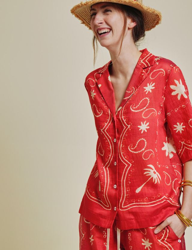 patterned red and natural shirt