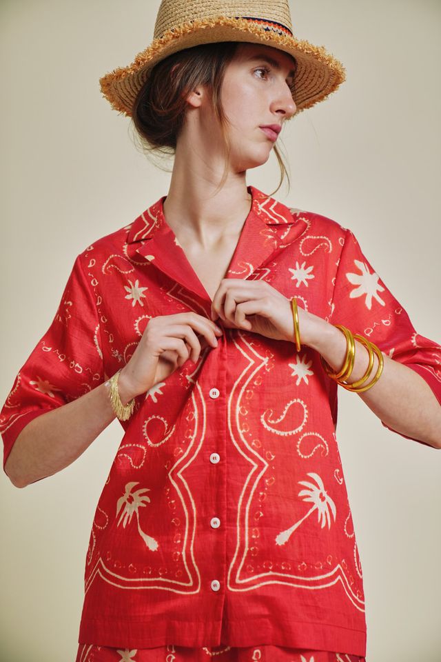 patterned red and natural shirt
