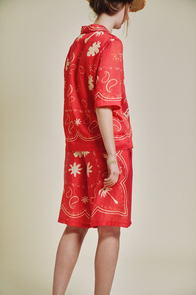 patterned red and natural shirt